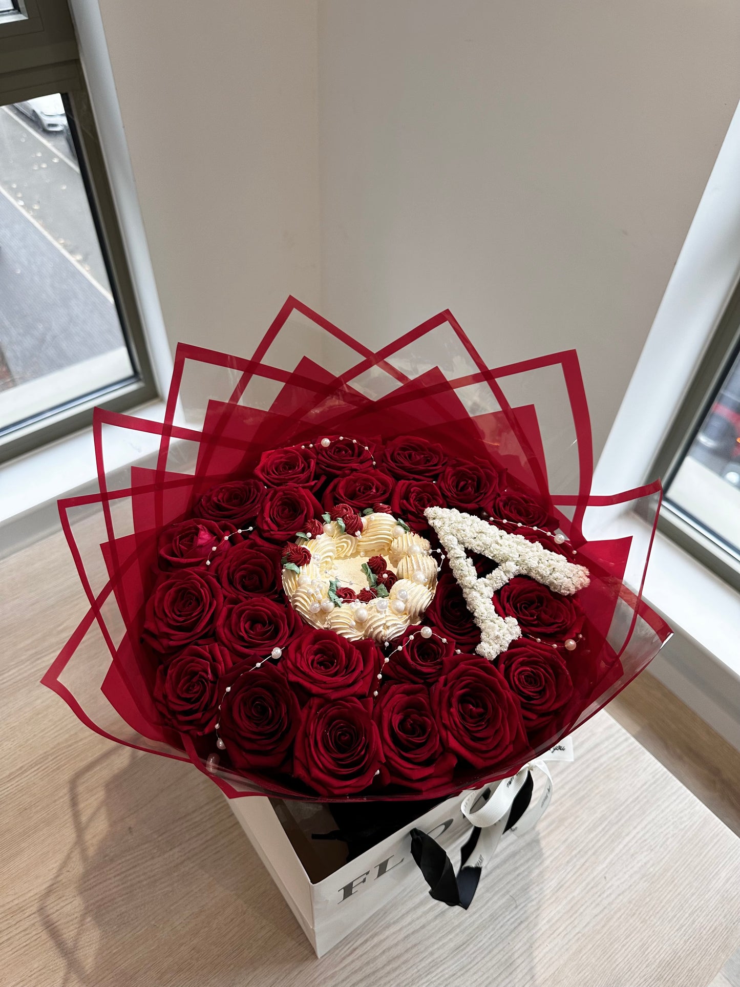 4” Round cake with 25 Roses